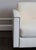 Ivory Baker Sofa featuring ivory leather and linen silk upholstery with Nailhead trim. Great condition! There are two...