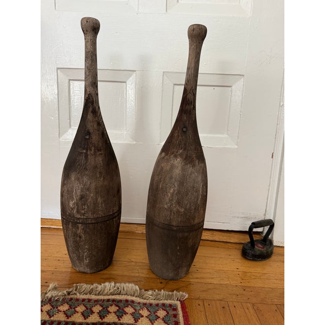 Turned from hardwood with a classic teardrop shape, they feature an elegant single-groove ring and original aged patina....