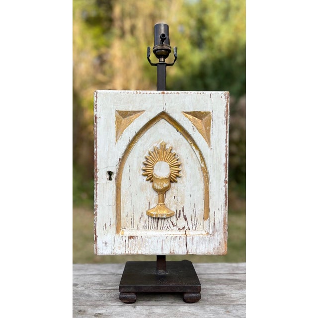 Unique table lamp made from an architectural salvage tabernacle door. The vintage religious building fragment features a...