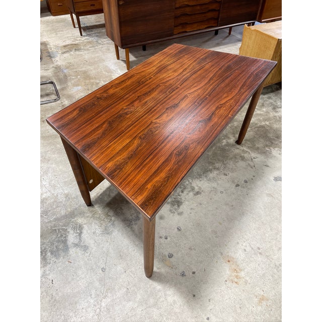 Danish Modern Rosewood desk with back panel. 47w front side, 59w back side, 30d, 29.5h