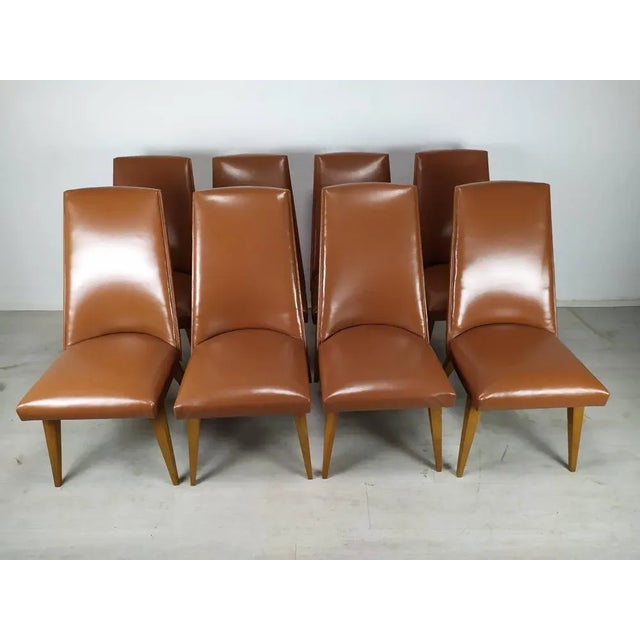 Leatherette Chairs, Set of 8, in Good conditions. Designed 1950 to 1959
