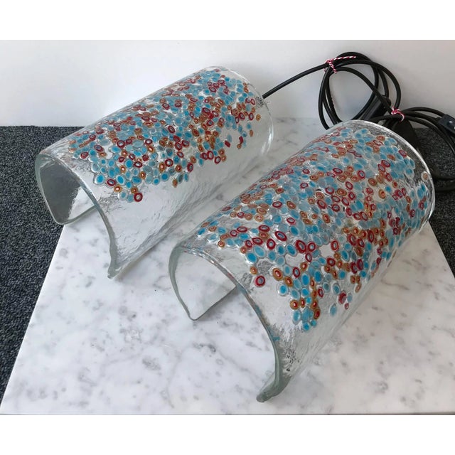 Pair of table or bedside lamps by the artist glassmaker Barbini at Murano. very particular glass. Sign on the glass,...