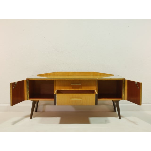 This vintage dressing table from the 1960s was originally designed as a vanity or dressing table and now serves as a...