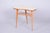 This elegant side table dates back to the 1950s and represents an iconic example of Czechoslovak "Mid-Century" design. The...