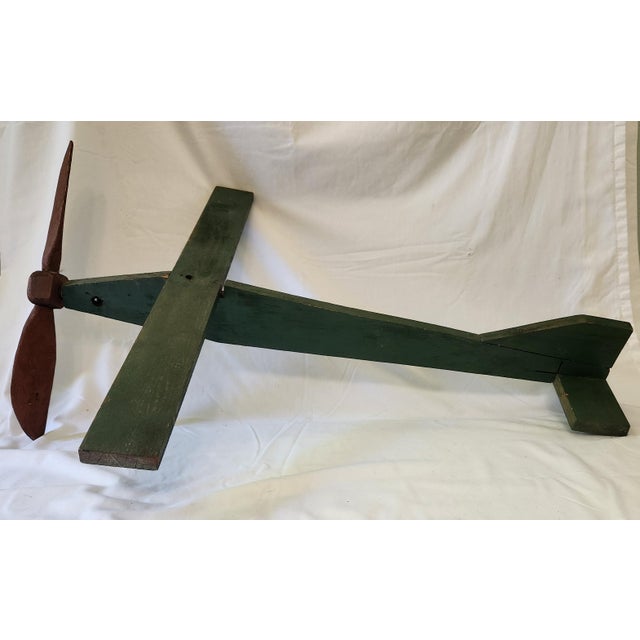 This remarkable Vintage 1940s Wooden Handmade Folk Art Aviation Airplane Weathervane is a rare find, pulled directly from...