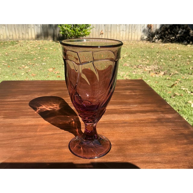 This is a beautiful set of Noritake Sweet Swirl cranberry colored ice tea glasses. These glasses have been discontinued...