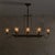 An Italian chandelier from the 1940s, pairing luminous glass with the warmth of brass. Eight curved arms extend from a...