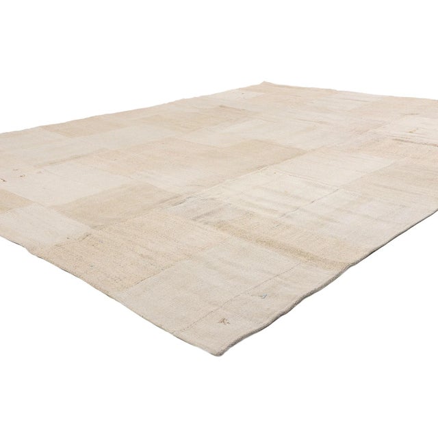 53527 Vintage Turkish Patchwork Kilim Rug, 09'00 x 11'11. Woven from the whispers of Anatolian earth and softened by...