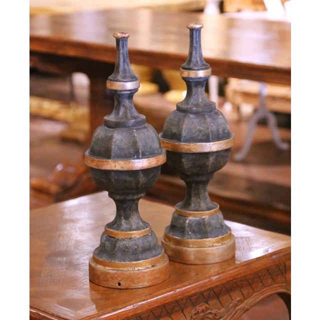 This striking pair of antique Italian architectural finials was crafted in wood circa 1950 and likely originated from an...