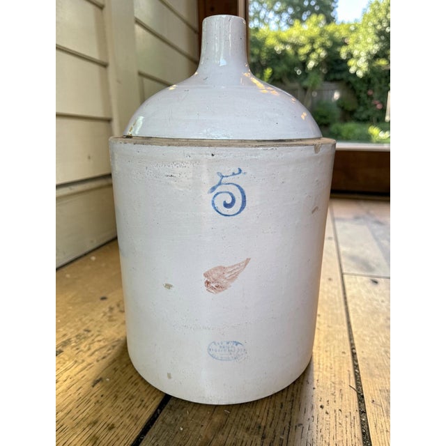 This authentic, early 20th-century 5-gallon shoulder jug was produced by the renowned Red Wing Union Stoneware Co. in Red...