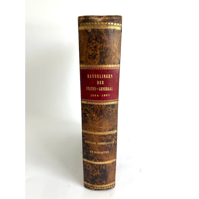 This oversized Dutch leather bound book is massive and beautiful with its marbleized cover. Translates to "Proceedings of...