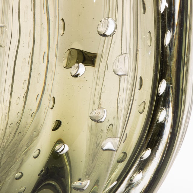 A striking fusion of organic form and Venetian mastery, this Hand-Blown Murano Cactus Vase in Fern Green with Bubbles...