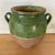 Wonderful painted green terracotta jug/ urn/ vase with two ears. Pierced underside and minor chips to its bottom. Could be...