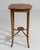 A distinguished example of Sheraton craftsmanship, this 19th-century English side table embodies the refined elegance that...