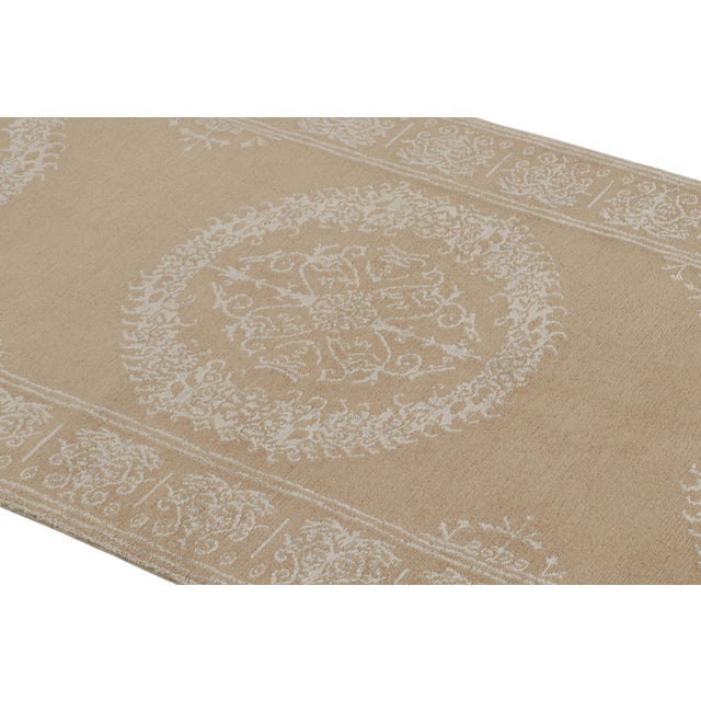 Inspired by an 18th century Spanish pattern, this modern wool and silk rug features a Catana design, characterized an...