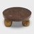 This stone top table exemplifies Organic Modern style with an emphasis on natural materials. The round stone top is carved...