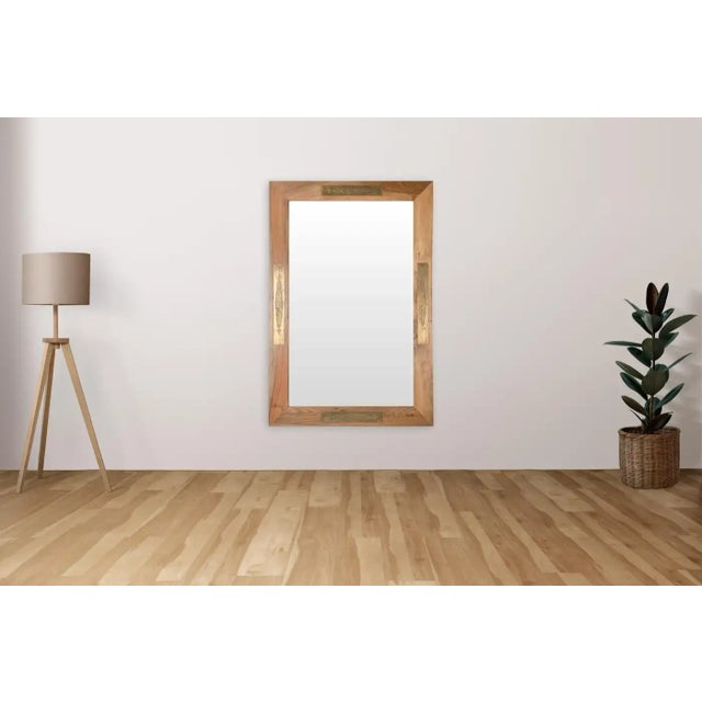 This handmade Organic Modern mirror captures the essence of understated elegance, blending natural materials with subtle...