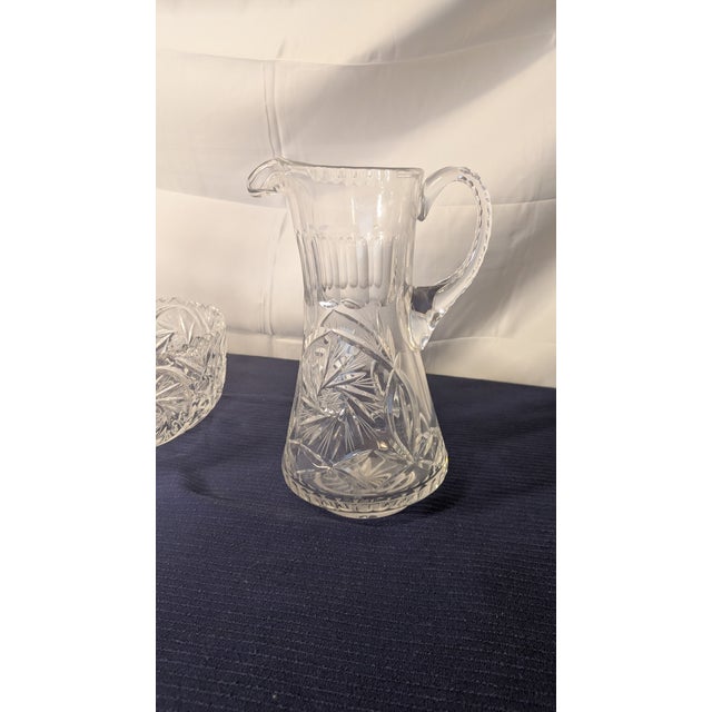 This is a stunning, authenticated three-piece serving set crafted from high-quality 24% lead crystal. Each piece features...