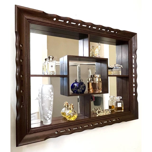 Wonderful antique continental English collectors wall shelf with mirror from the early 1900's. The piece is hand made of...