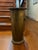 Antique brass umbrella stand with two lions head. H: 22” Diameter: 10.5”