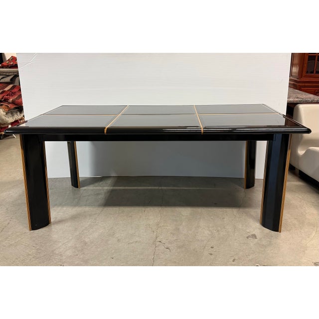 Design Plus Gallery presents a Vintage Black Lacquer Extension Dining Table by Pierre Cardin from Roche Bobois. Dating to...
