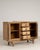 A distinguished example of French Art Deco craftsmanship, this circa 1940 sideboard is rendered in richly grained oak with...