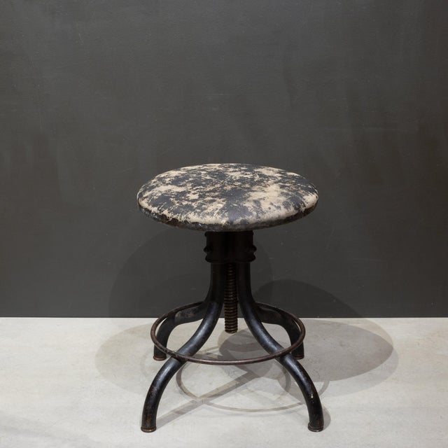 ABOUT Authentic industrial swivel stool from the 1930s, crafted from cast iron with genuine patina and distressing....