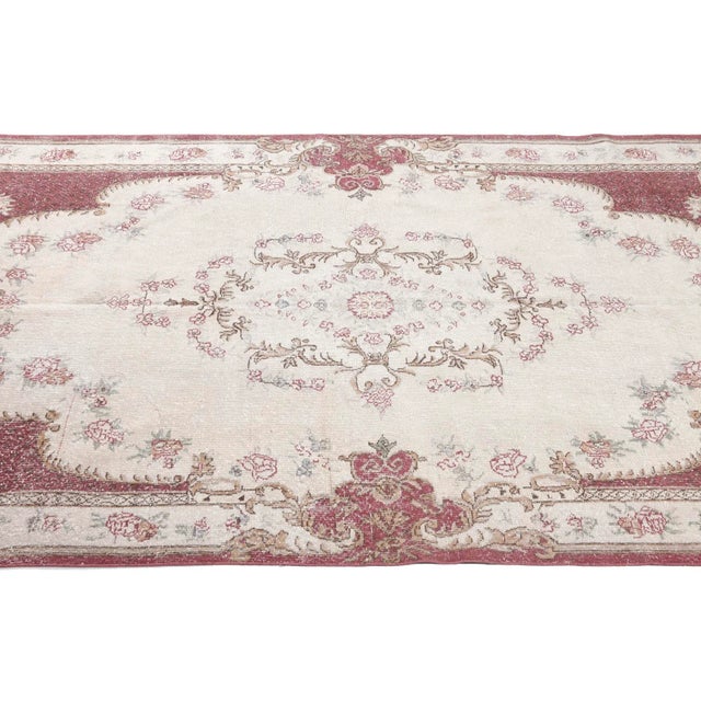 Vintage handknotted rug from Oushak region of Turkey. Approximately 50-60 years old. In very good condition.