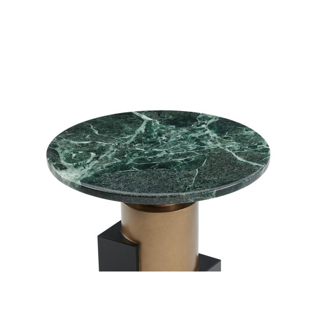 This chic round side table brings a playful pop of personality to any room. Featuring a stunning green marble top paired...