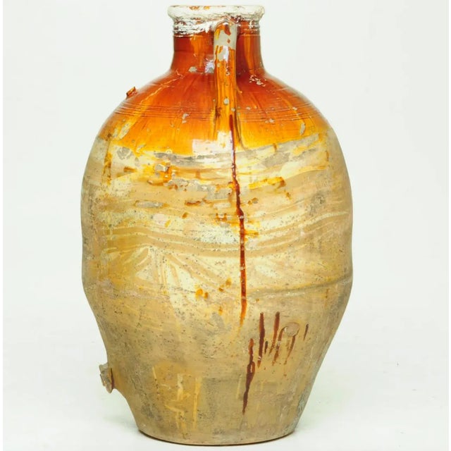 Impressive Italian olive oil jar with double handles and front spout. Yellow-glazed pottery. C. 1870-1890 Great as a...