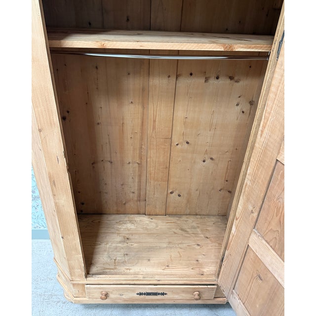 A distinctive piece rooted in the rural traditions of alsace or the vosges region, this bonnetière (a type of wardrobe)...