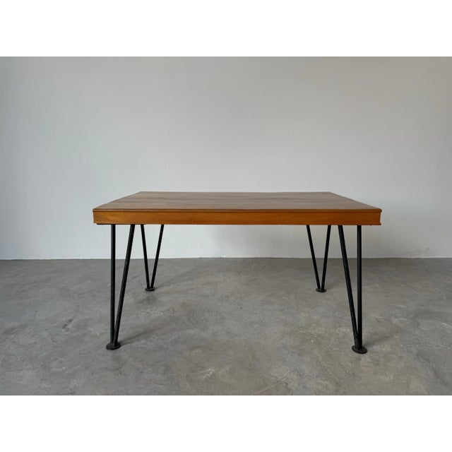 Available for sale this Fantastic Vintage Mid Century Modern teak wood top coffee table with iron hairpin legs. Item...