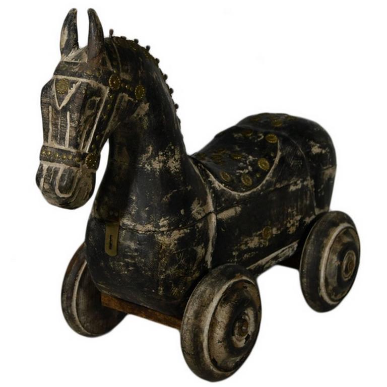 vintage wooden horse on wheels