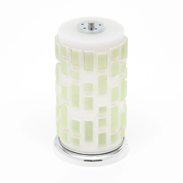 Table lamp from mid-century German with a modern design The lamp features a chrome interior structure, base, and top...