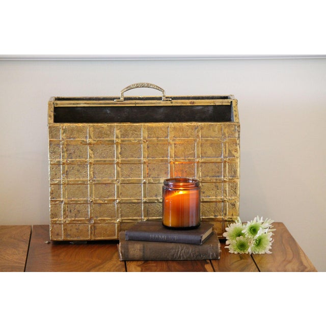 This vintage piece from the 1970s is a plaid-patterned brass-wrapped wooden magazine stand. Made to sit on the floor next...