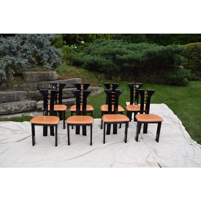 This is an incredible Pierre Cardin for Roche Bobois 1970s Black Lacquer Dinning Set. The set includes 8 chairs, a table,...