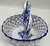 Beautifully decorated pierced hand-made and hand-painted blue and white centerpiece basket with large center blue floral...