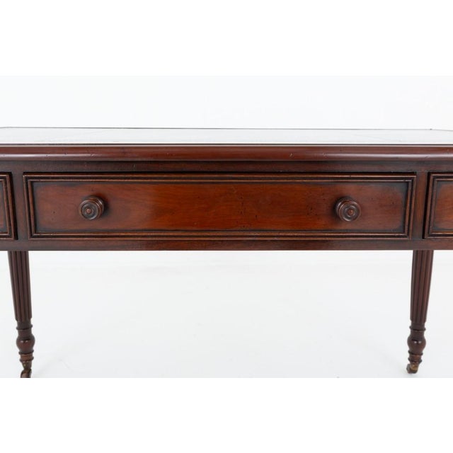 Regency style 3 drawer mahogany library table or desk This library table stands upon typical regency turned and fluted...