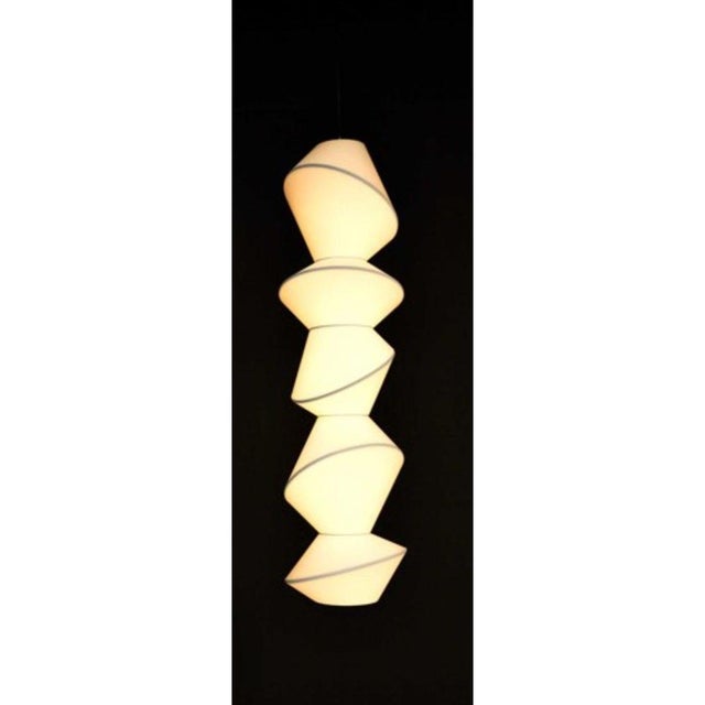 Totem 5 pieces ceiling lamp by merel karhof and marc trotereau dimensions: d50 x h174 cm materials: cotton laminated on...