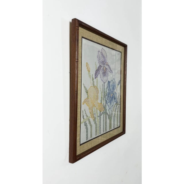 Vintage Iris Cross Stitch. Enhance your home with a vintage Crosstitch featuring three irises – one yellow, one blue, and...