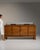 Glass-top walnut sideboard in Rich Walnut Brown. Its rich walnut brown finish sets off four doors, protective glass top...