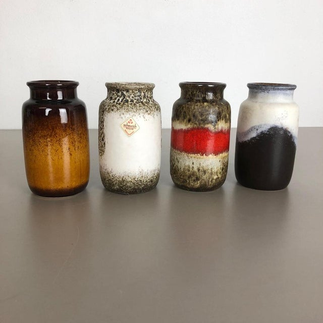 Article: Set of five fat lava art vases. Producer: Scheurich, Germany. Decade: 1970s. These original vintage vases was...