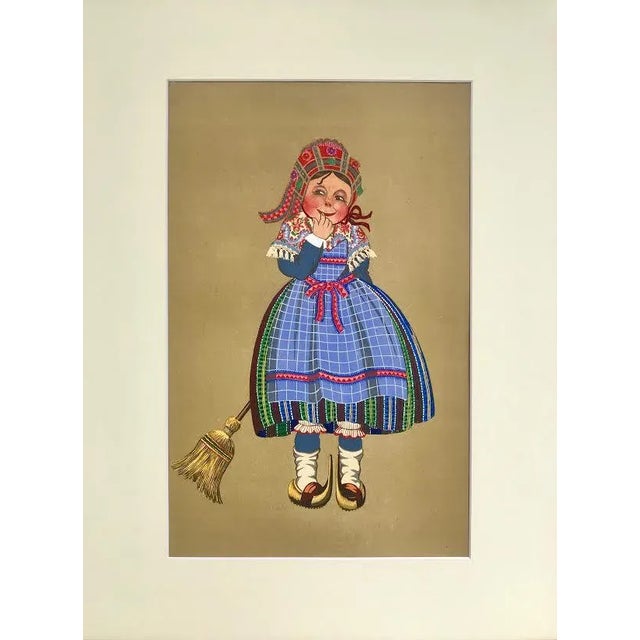 An original vintage / antique fine hand made pochoir color print of traditional costumes of France printed in 1929....