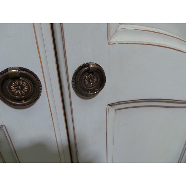 This is a Rococo style wardrobe. its been restored and repainted with Milk Paints "Oyster White"