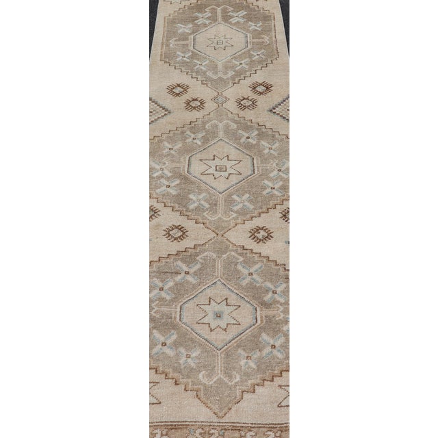 Measures: 2'3"X9'4" Vintage Turkish Oushak Runner in Soft Earth Toned Medallion 2'3"X9'4". Keivan Woven Arts / Rug /...