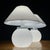 Behold this exquisite pair of Murano mushroom lamps, crafted with precision in Italy during the vibrant 1970s. Each lamp...