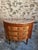 Elegant French demi-lune commode dating from the late 18th century, crafted in the refined Louis XVI style. Featuring a...