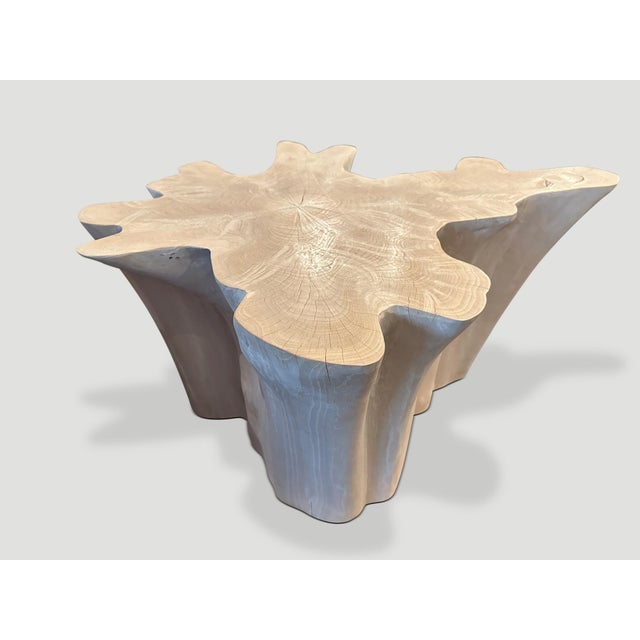 Impressive reclaimed bleached teak amorphous coffee table. A slight graduation from the bottom to the top. We have added a...