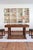 A French dining table in solid oak, rustic Art Deco, 1930s-40s. What makes this table is the base: four bobbin-turned legs...