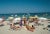 Saint-Tropez Beach 1977 Sunbathers on the beach at St. Tropez, France, 1977. (photo Slim Aarons) Slim Aarons was one of...